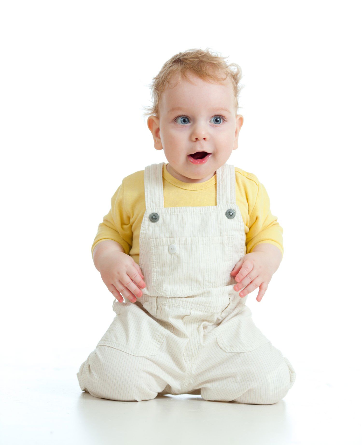 Barn sidder på knæene og danser til musik
